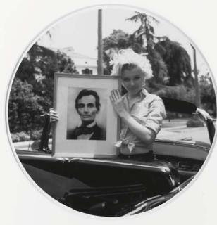 Milton Greene - Marilyn Monroe holding a portrait of Abraham Lincoln, 1950s