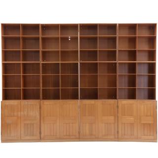 Mogens Koch - Wall unit of solid Oregon pine, consisting of four cabinets, eight bookcases and five plinths, cabinets and seven bookcases with brass fittings