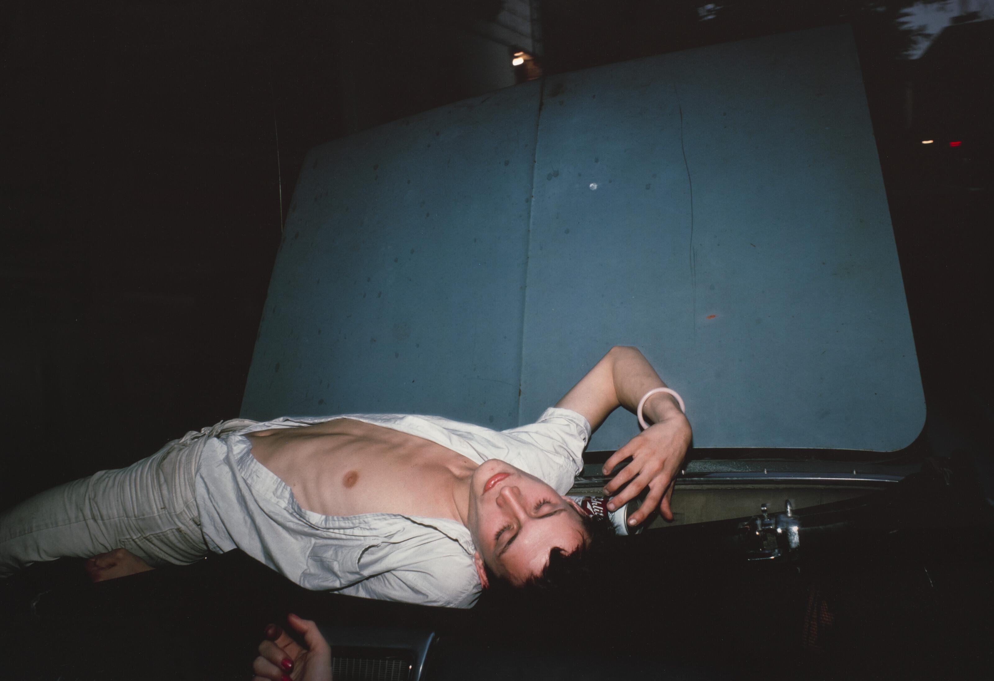 Nan Goldin - French Chris on convertible, NYC, 1979