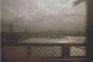 Nan Goldin - New York Skyline from Bridge, 1994