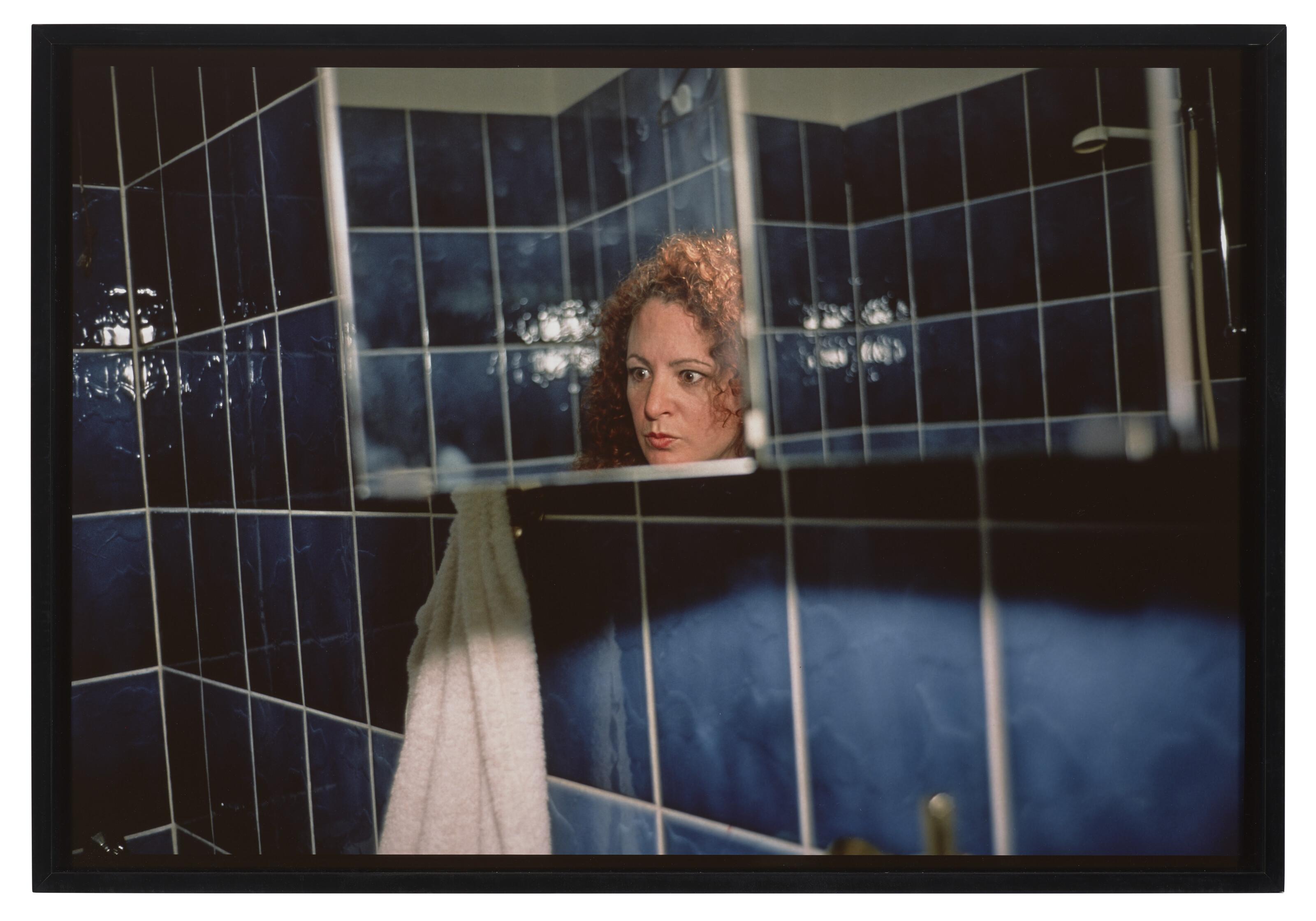 Nan Goldin - Self-portrait in my blue bathroom, Berlin, 1991