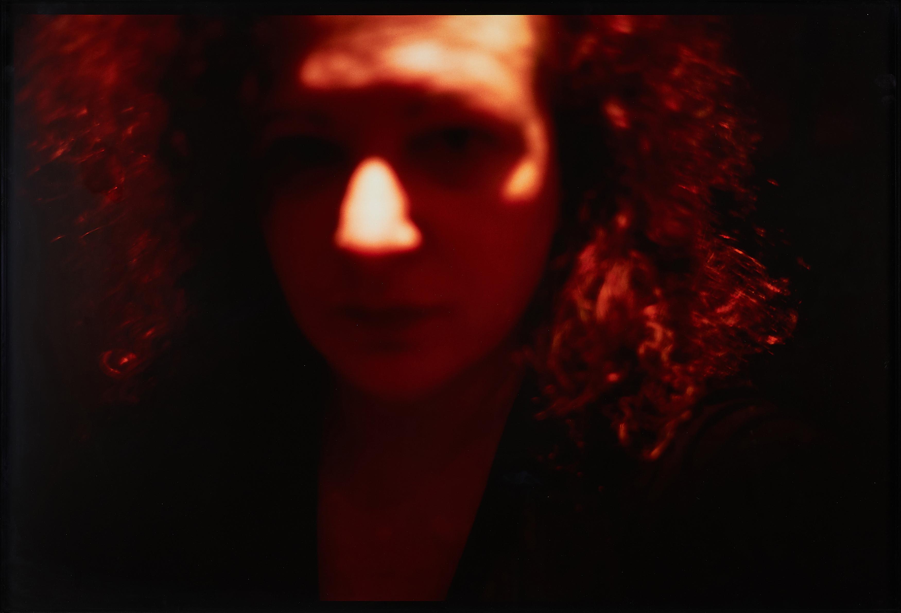 Nan Goldin - Self-portrait, red, Zurich.