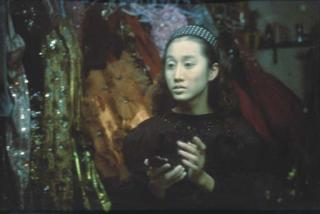 Nan Goldin - Yogo In The Mirror, Bangkok, 1992