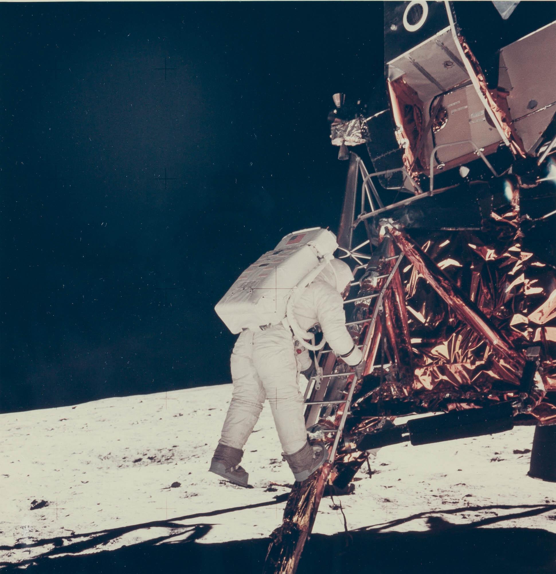 Neil Armstrong - Apollo 11: Edwin Aldrin decending the Lunar Module ladder.