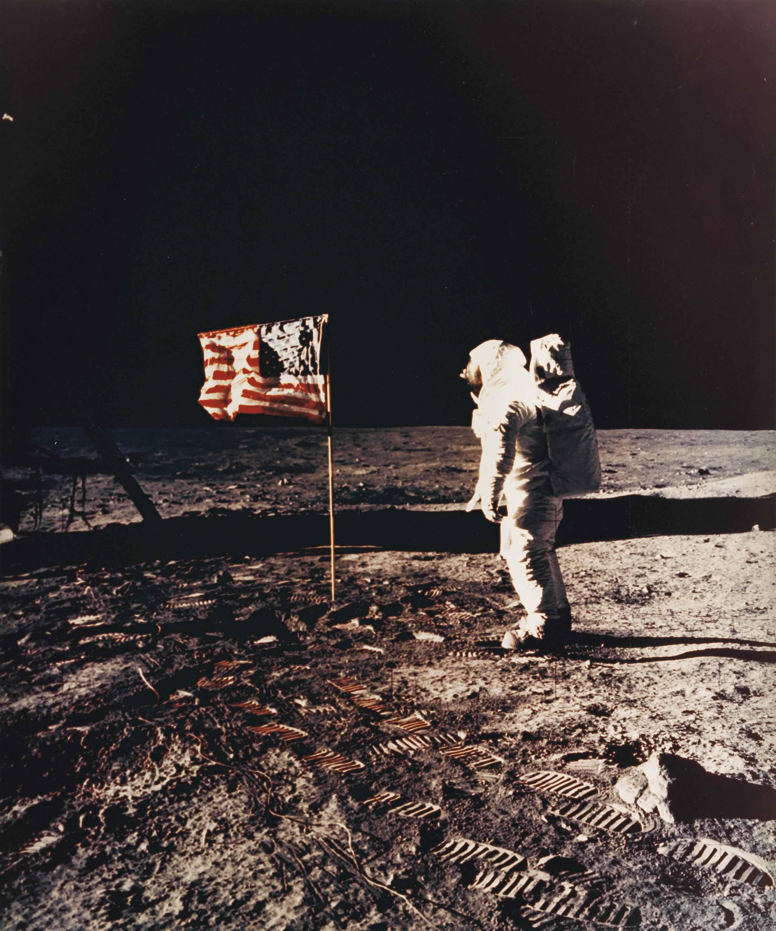 Neil Armstrong - Buzz Aldrin standing beside the U.S. flag, Apollo 11, July 1969