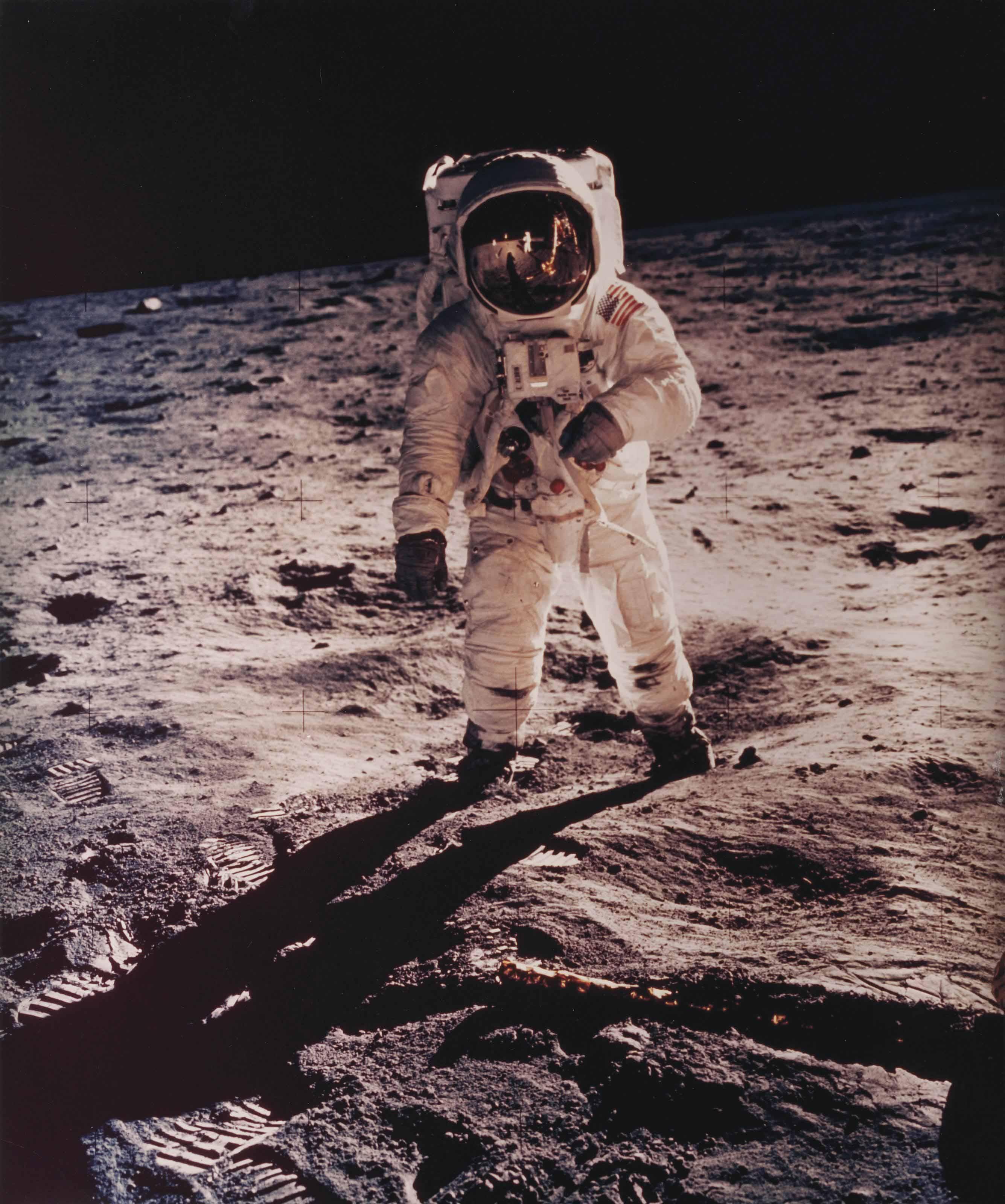 Neil Armstrong - Buzz Aldrin with Lunar Module reflected in his visor, Apollo 11, July 1969