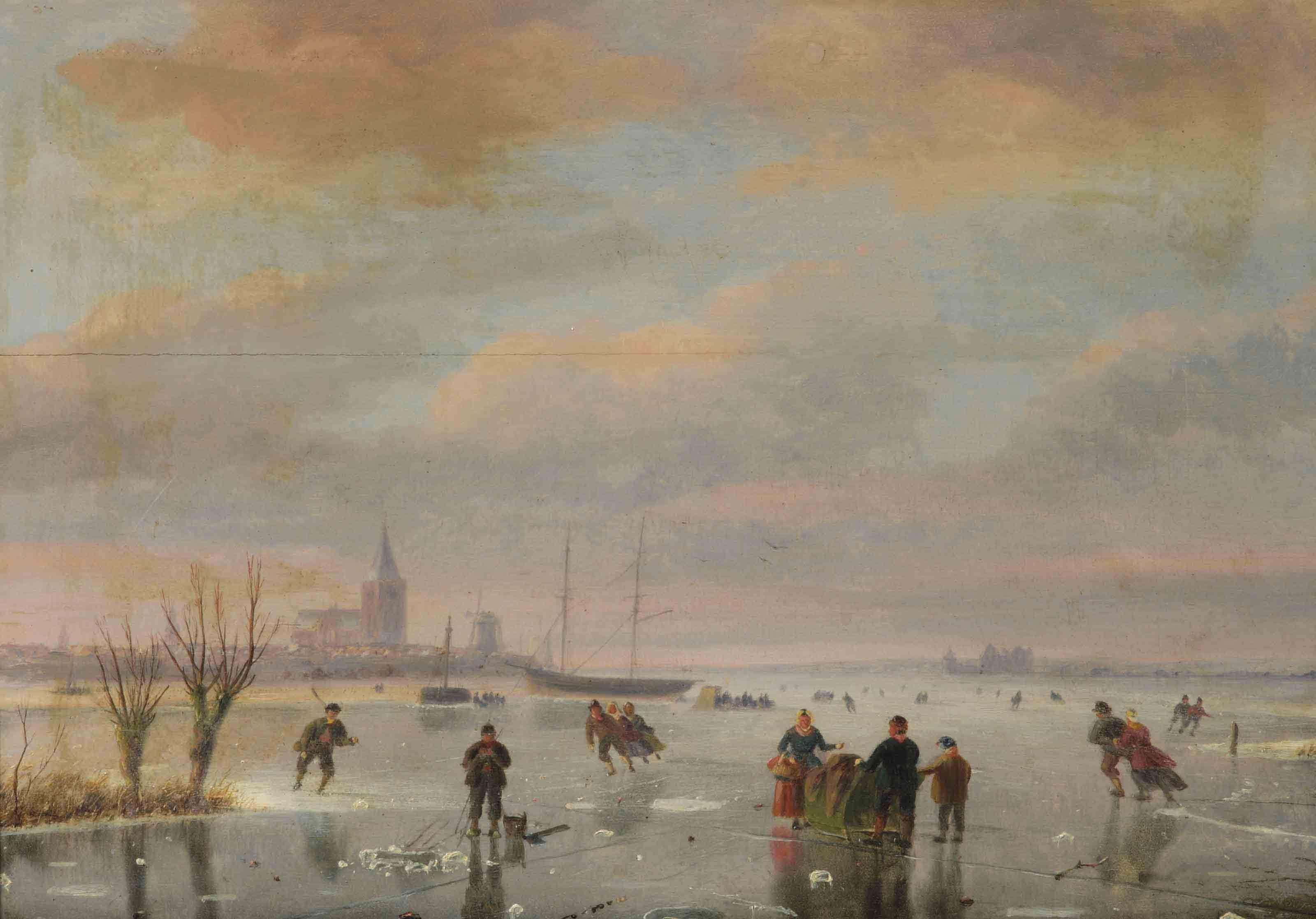 Nicolaas Johannes Roosenboom - A winter landscape with figures skating