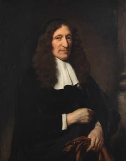 Nicolaes Maes - Portrait of a gentleman, standing three-quarter-length, holding his gloves