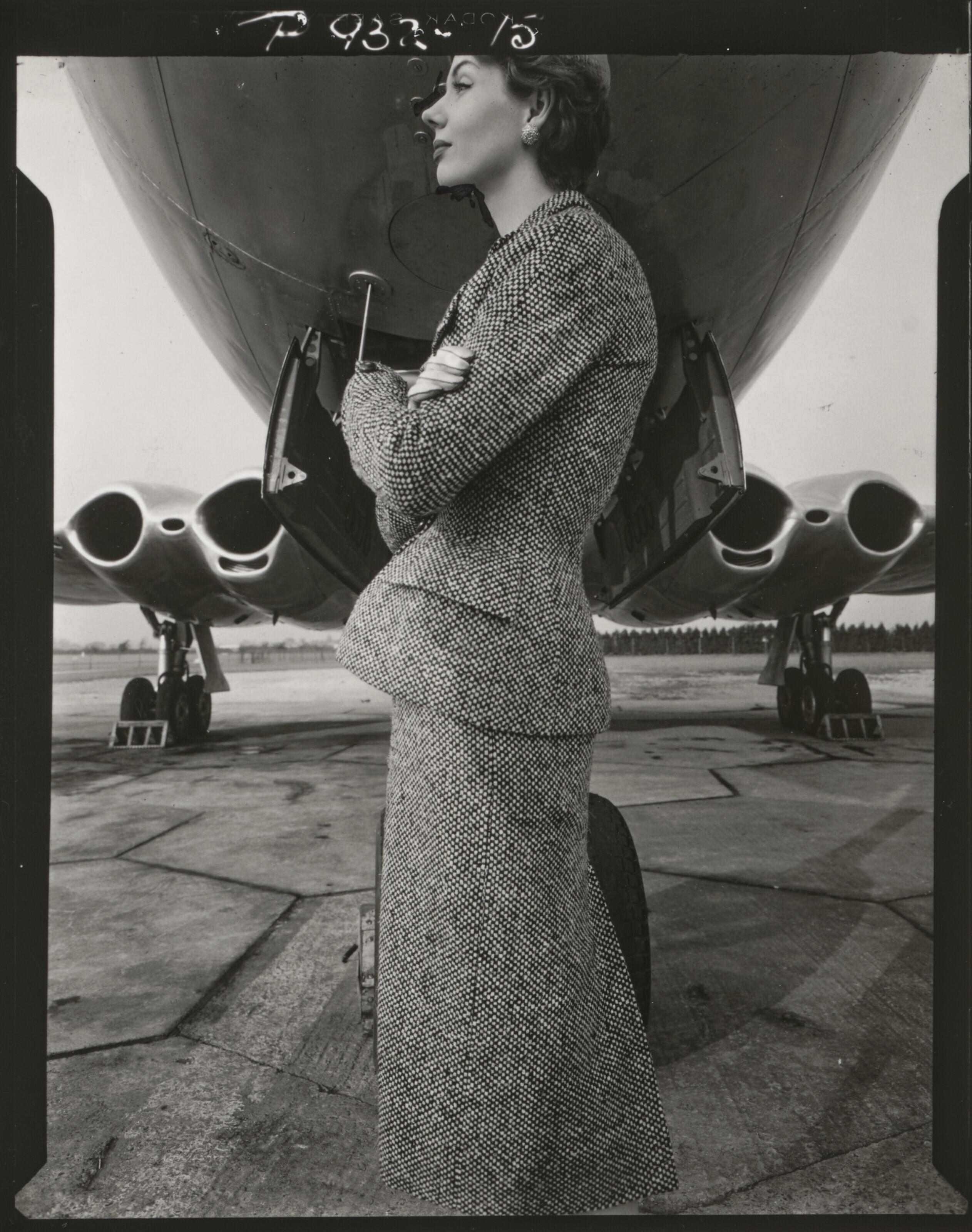 Norman Parkinson - Precision Built: Model Enid Boulting in Suit By Hardy Amies, Vogue, February 1954