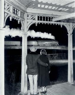 O. Winston Link - Mr. and Mrs. Pope watch the last steam powered passenger train, Max Meadows, Virginia, 1957