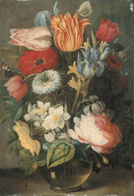 Osias Beert I - Tulips, roses, lilies, irises and other flowers in a glass vase on a ledge with butterflies