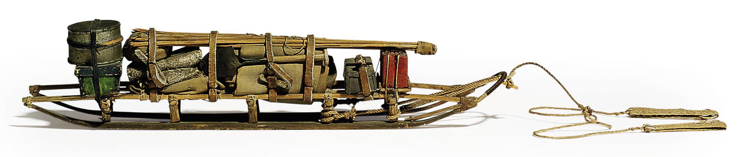 Patrick Keohane - British Antarctic Expedition, 1910-13: A scale model of a loaded sledge with trace and two harnesses, made by Keohane in the hut at Cape Evans