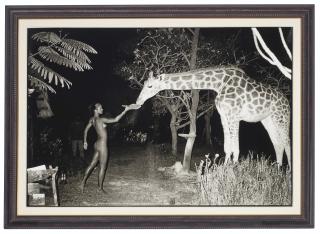 Peter Beard - Maureen Gallagher and a night feeder at Hog Ranch, February, 1987