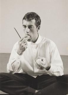 Peter Hujar - Forbidden Fruit\' (David Wojnarowicz Eating an Apple in an Issey Miyake shirt) from The Twelve Perfect Christmas Gifts from Dianne B., 1983