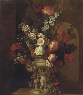 Pieter Casteels III - Mixed flowers in a sculpted urn with putti on a ledge, in an interior