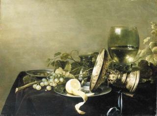 Pieter Claesz. - A Vanitas still life with a partially peeled lemon, grapes and olives on pewter dishes, an overturned gold tazza, an upturned glass, and a roemer of wine on a draped table