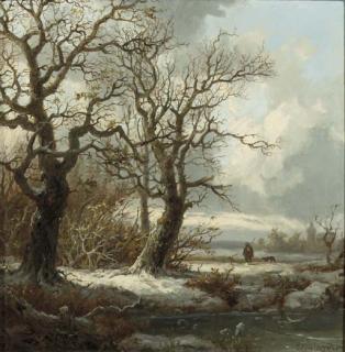Pieter Lodewijk Francisco Kluyver - A winterlandscape with a traveller on a path
