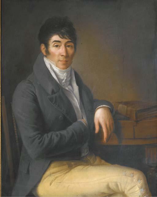 Portrait D\'Un Homme Assis À Un Bureau