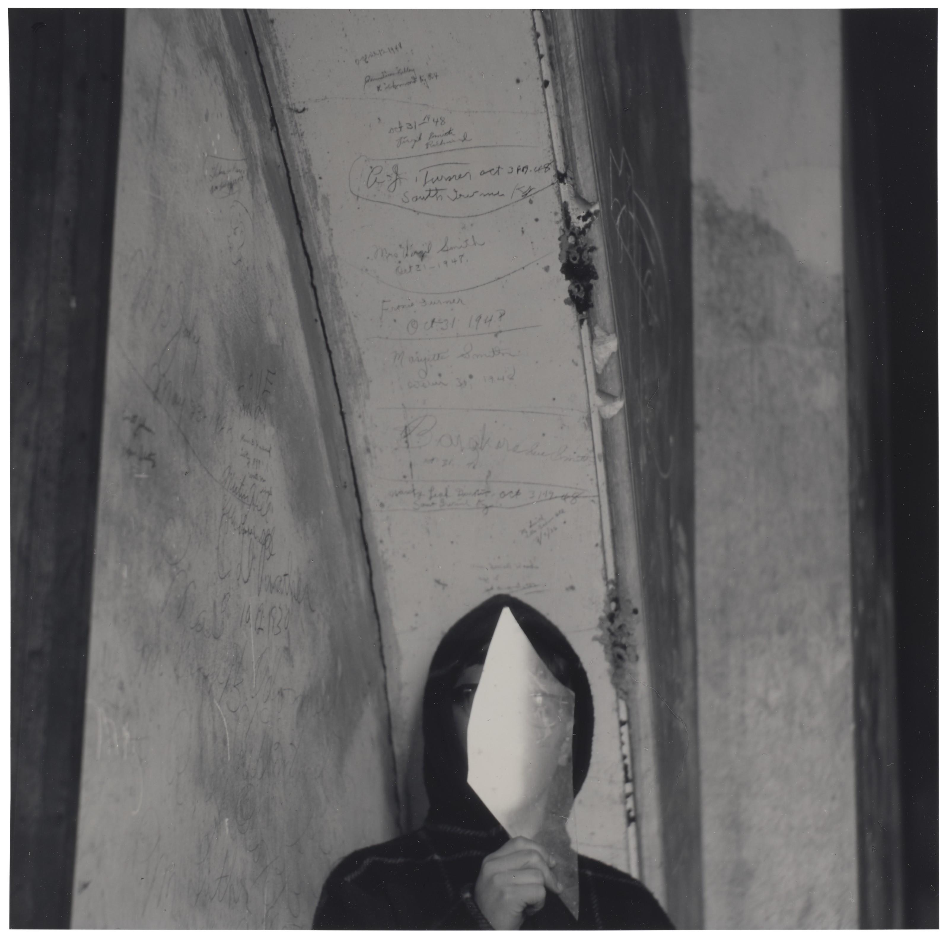 Ralph Eugene Meatyard - Untitled (Boy Holding Shard Of Glass Before Face), 1966
