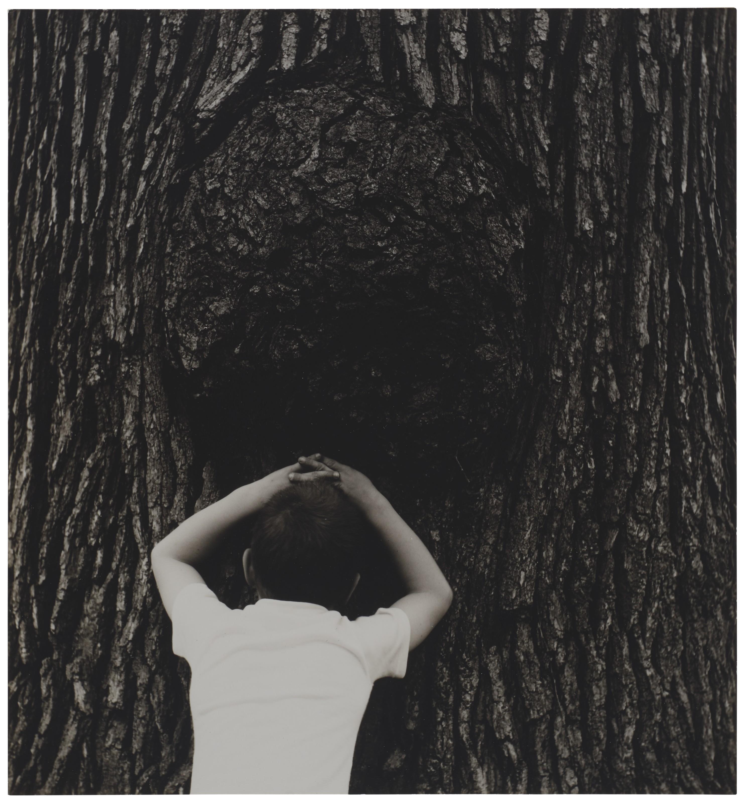 Ralph Eugene Meatyard - Untitled (Boy Leaning Against Tree), 1963