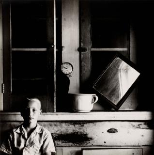 Ralph Eugene Meatyard - Untitled (Boy with clock and mirror)
