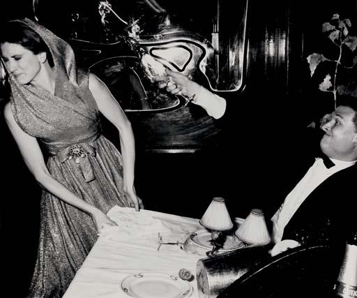 Richard Avedon - Suzy Parker and Mike Nichols, Dress by Dior, Maxim\'s, Paris, August 1962