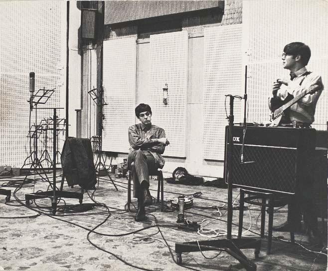 Robert Freeman - Paul McCartney and John Lennon, relaxing during a recording session at EMI Abbey Road recording studios, c. 1965