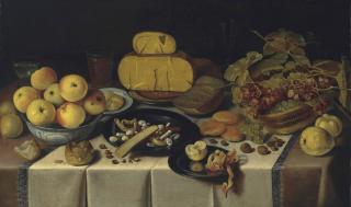 Roelof Koets - A banquet with cheese and fruit on pewter plates, a basket of grapes, apples in a Wan-Li Kraak porcelain bowl, and bread and glasses on a draped table