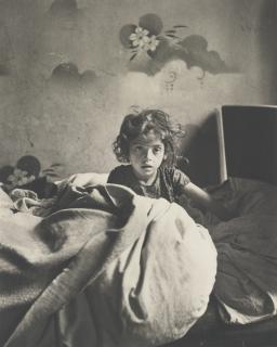 Roman Vishniac - Sara, Sitting In Bed In Basement Dwelling, With Stenciled Flowers Above Her Head, Warsaw