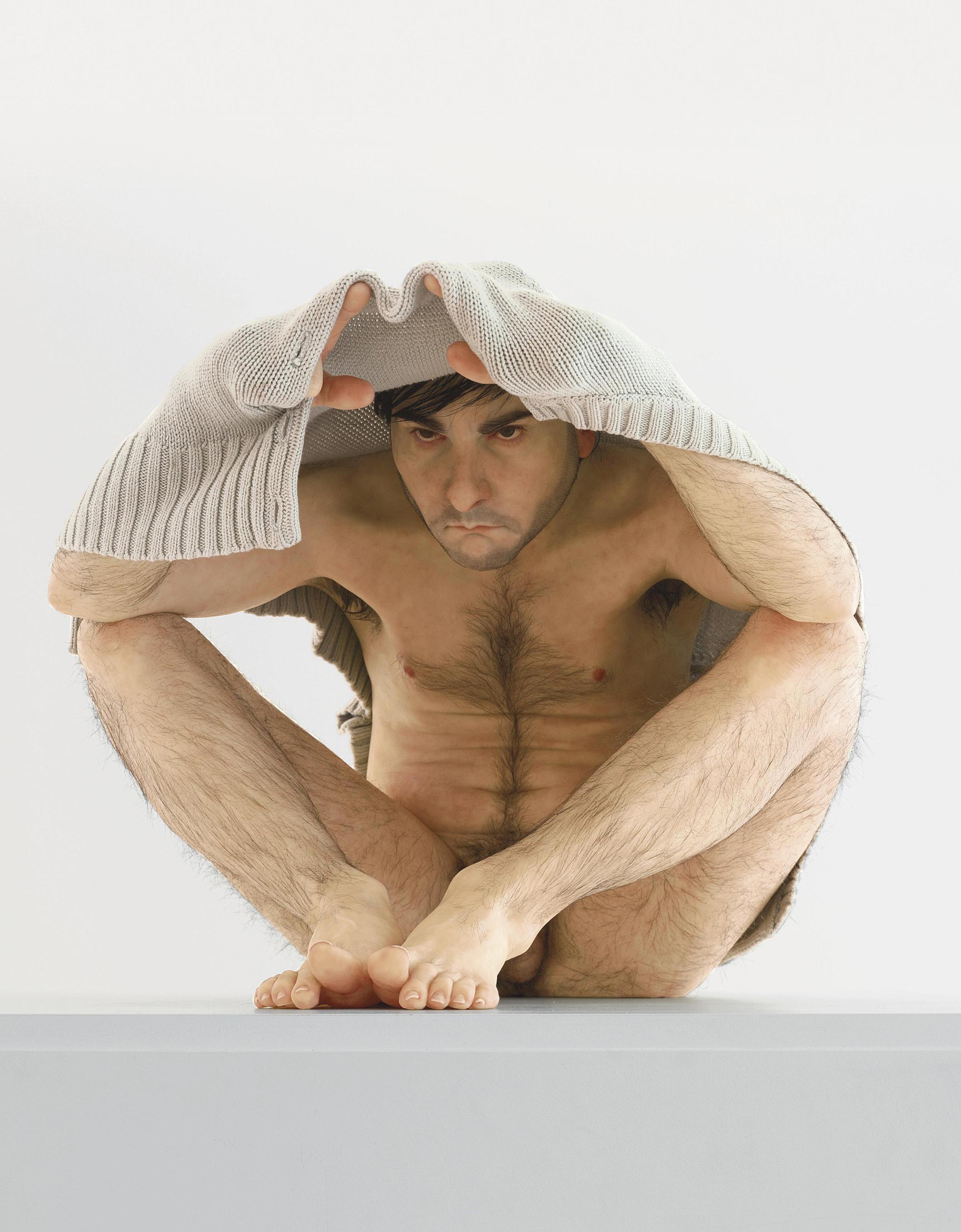 Ron Mueck - Man Under Cardigan
