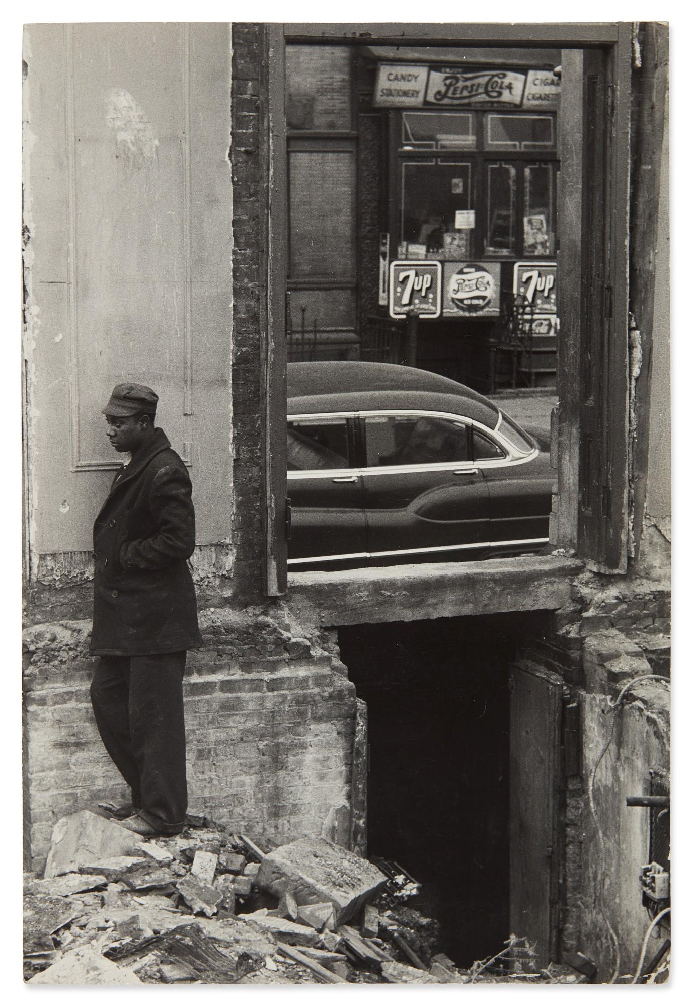 Roy DeCarava - Man Standing Outside of a Building