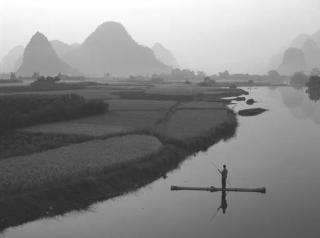 Russel Wong - Bamboo Raft On Yu Long River, Yangshuo, China