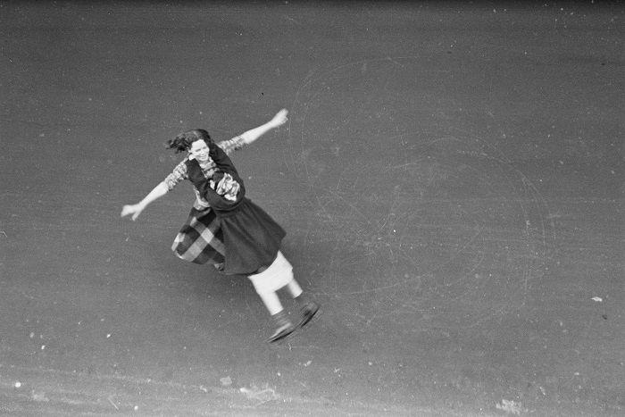 Ruth Orkin - Girls twirling on street, New York City