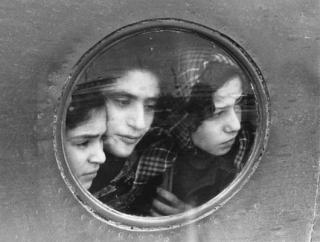 Ruth Orkin - Jewish Refugees from Iraq land at Tel Aviv Airport (1951)