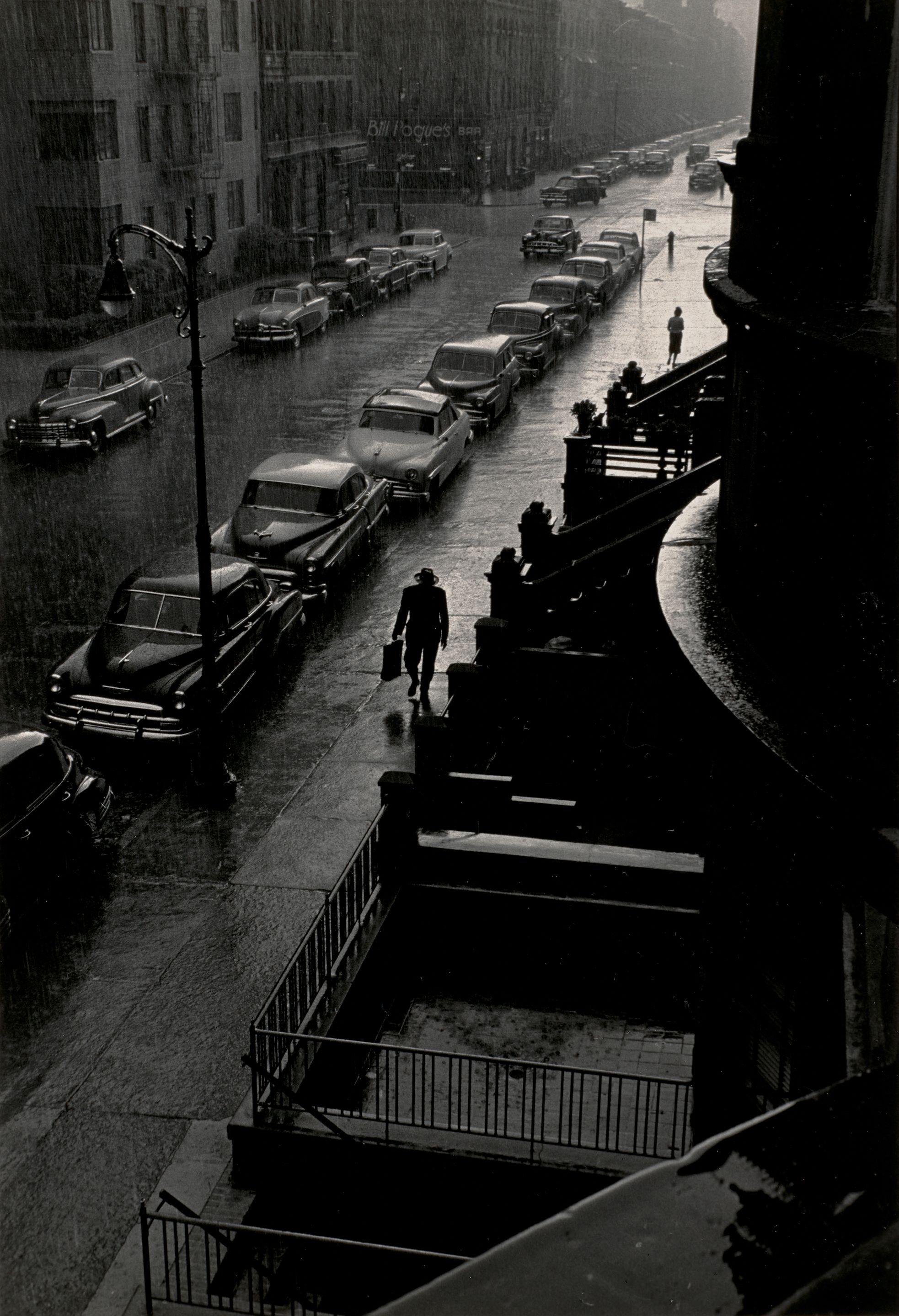 Ruth Orkin - Man in Rain, West 88th Street, New York City