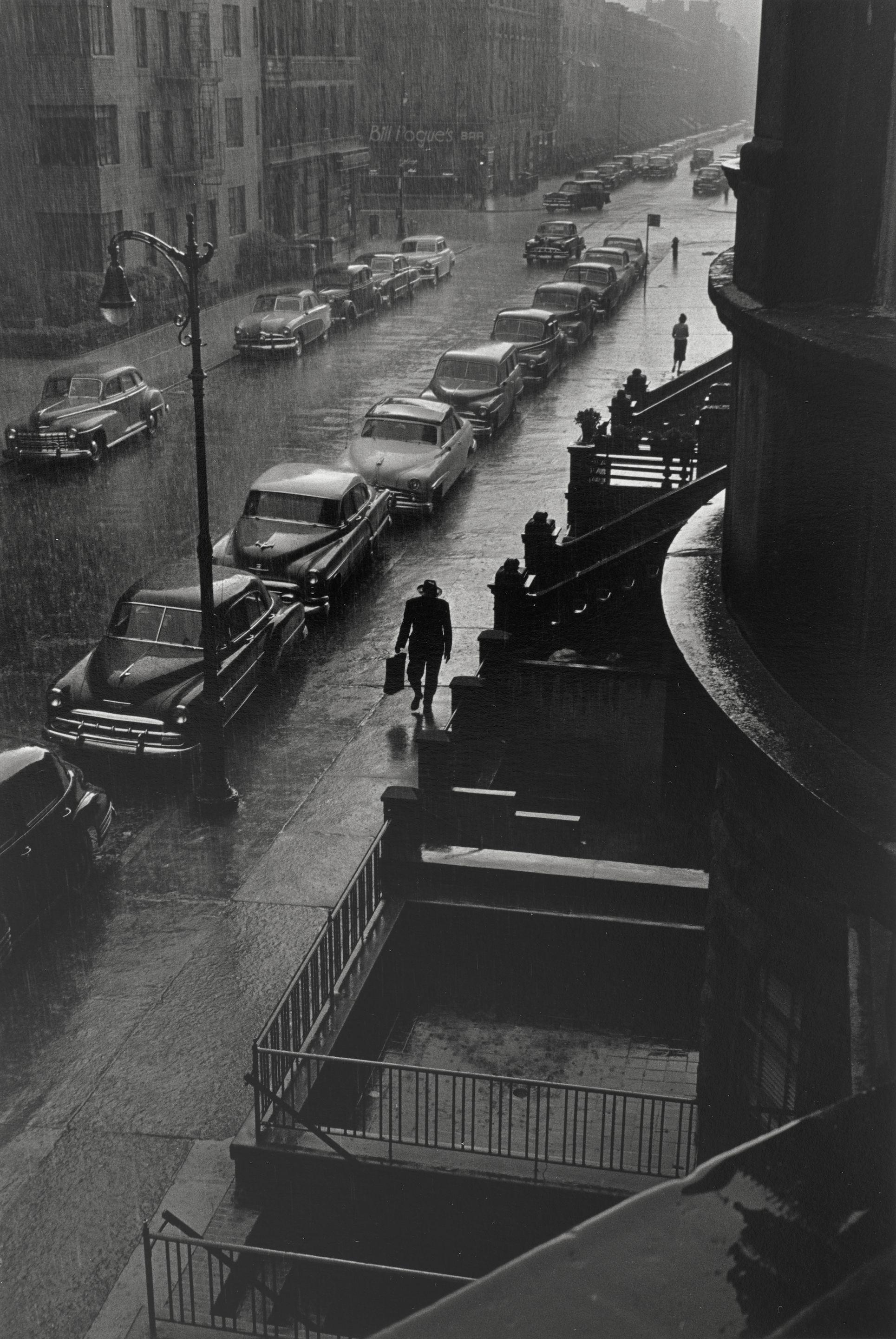 Ruth Orkin - Man in Rain, West 88th Street, New York City