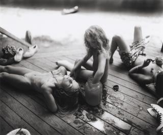 Sally Mann - Listening to Madonna by the Tadpole Jar, 1990