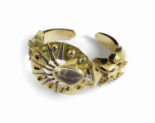 Salvador Dalí - An 18k gold and gem-set watch/bangle