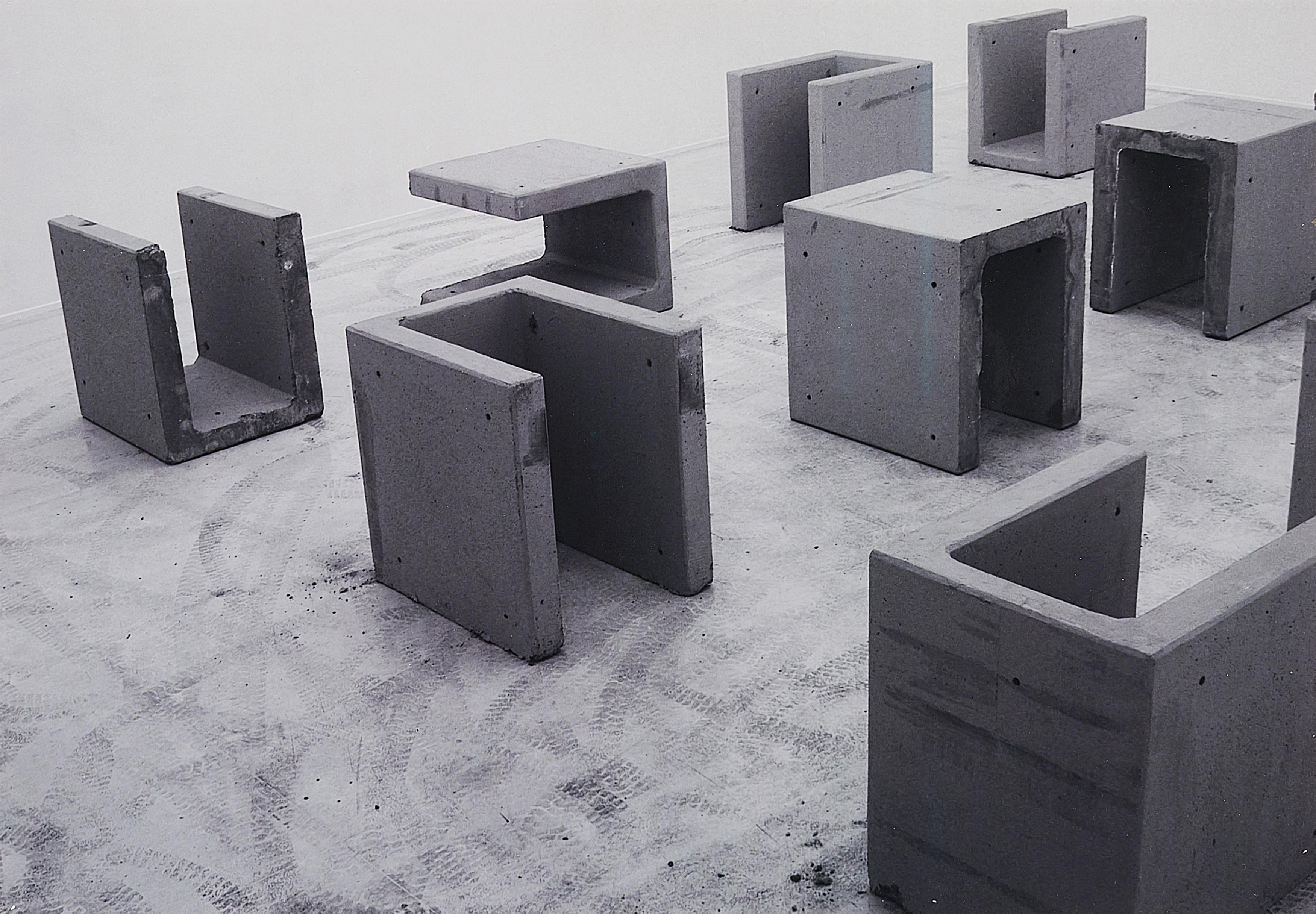 Santiago Sierra - Arrangement of 12 prefabricated fortifications. Herzliya Museum, Herzliya, Israel September 2004.