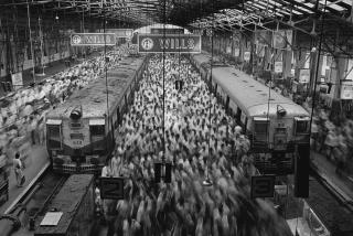 Sebastião Salgado - Church Gate Station, Western Railroad Line, Bombay, India, 1995