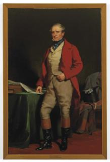 Sir Daniel Macnee, P.R.S.A. - Portrait of William Aird, member of the Lanarkshire and Renfrewshire Foxhounds, full-length, in hunting dress, standing by a green draped table, his right hand resting on a newspaper