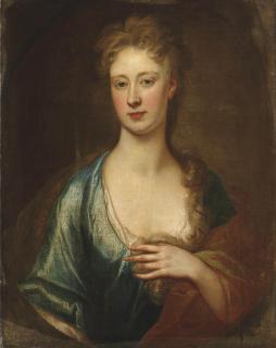 Sir Godfrey Kneller - Portrait of a lady, traditionally identified as Catherine Perceval (c.1689-1749), Countess of Egmont, bust-length, in a blue dress and brown wrap, in a feigned oval