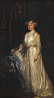 Sir James Jebusa Shannon, RA, RBA, RHA - Portrait of a lady, standing full-length, in a cream dress, resting her right hand on a chair