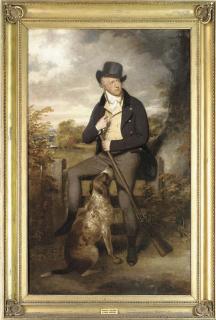 Sir William Beechey, R.A. - Portrait of Richard Thompson, full-length, in a dark coat with a yellow waistcoat, seated on a fence holding a gun and powder flask, a retriever at his feet