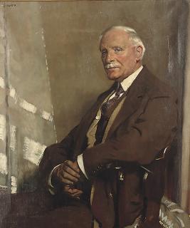 Sir William Newenham Montague Orpen, R.A., R.W.S., - Portrait of Thomas Glass, seated half-length, in a brown three-piece suit