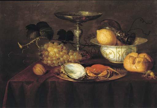 Theodoor Smits - A Silver Dish With An Oyster And A Crab, A Walnut, White Grapes, A Silver \'Tazza\', A Porcelain Bowl With Lemons And A \'Roemer\', A Bread Roll, All On A Draped Table