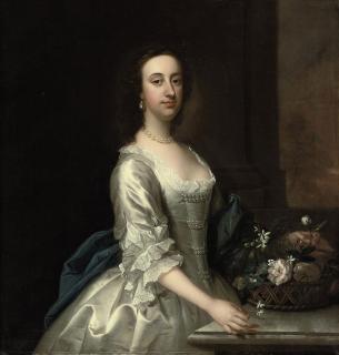 Thomas Hudson - Portrait of a lady, three-quarter-length, in a lace-trimmed satin oyster dress with pearl ornaments and blue wrap, beside a ledge with a basket of flowers