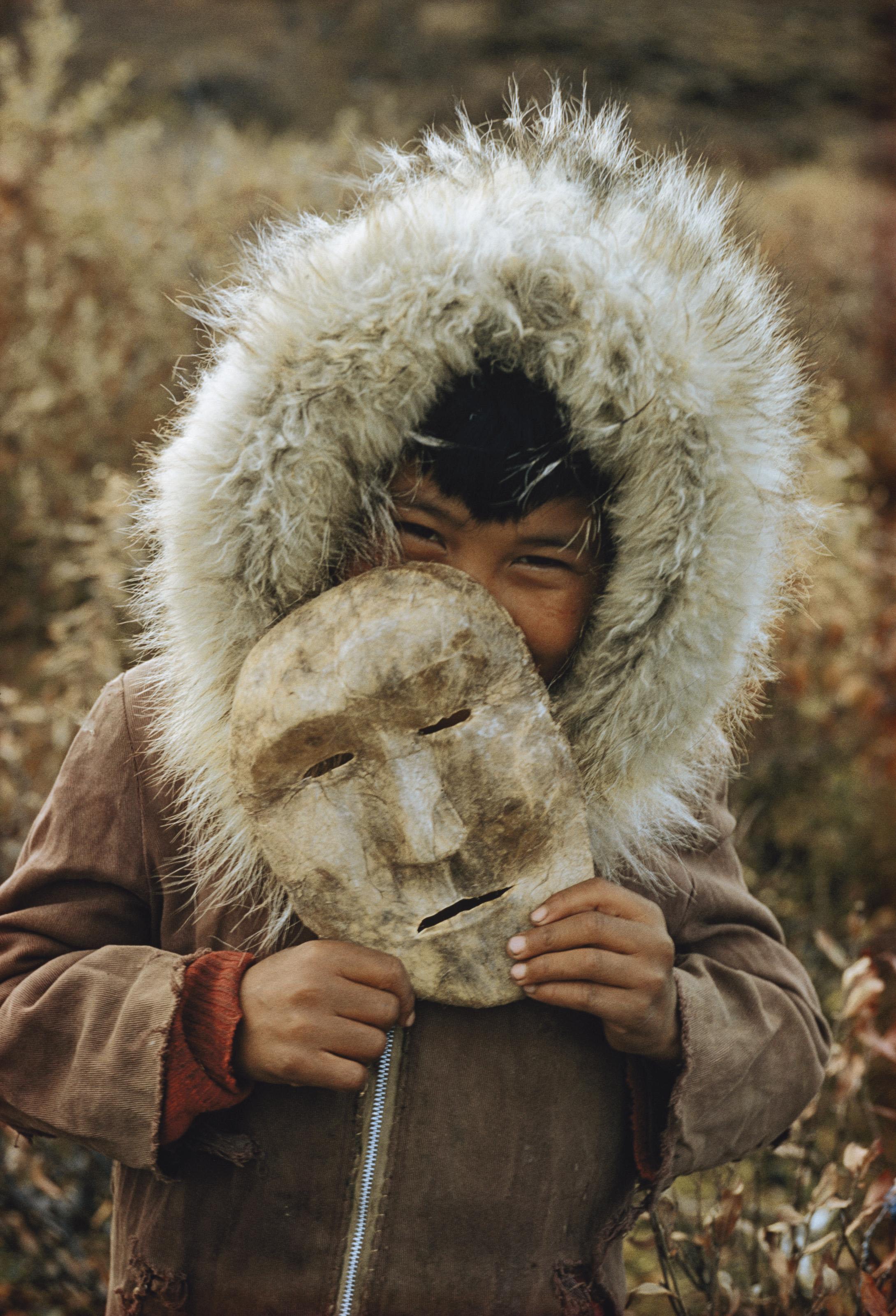 Thomas J. Abercrombie - A Nunamiut Boy and Mask, Alaska, c. 1958