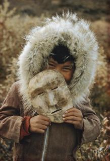 Thomas J. Abercrombie - A Nunamiut Boy and Mask, Alaska, c. 1958