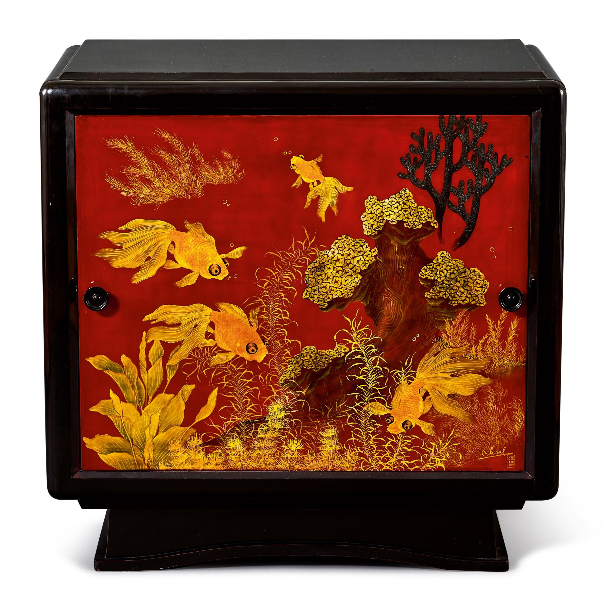 Truong Van Thanh - A lacquer cabinet with a panel decorated with fish